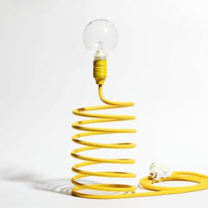 Lampa na stolik sprężyna w kolorze żółtym